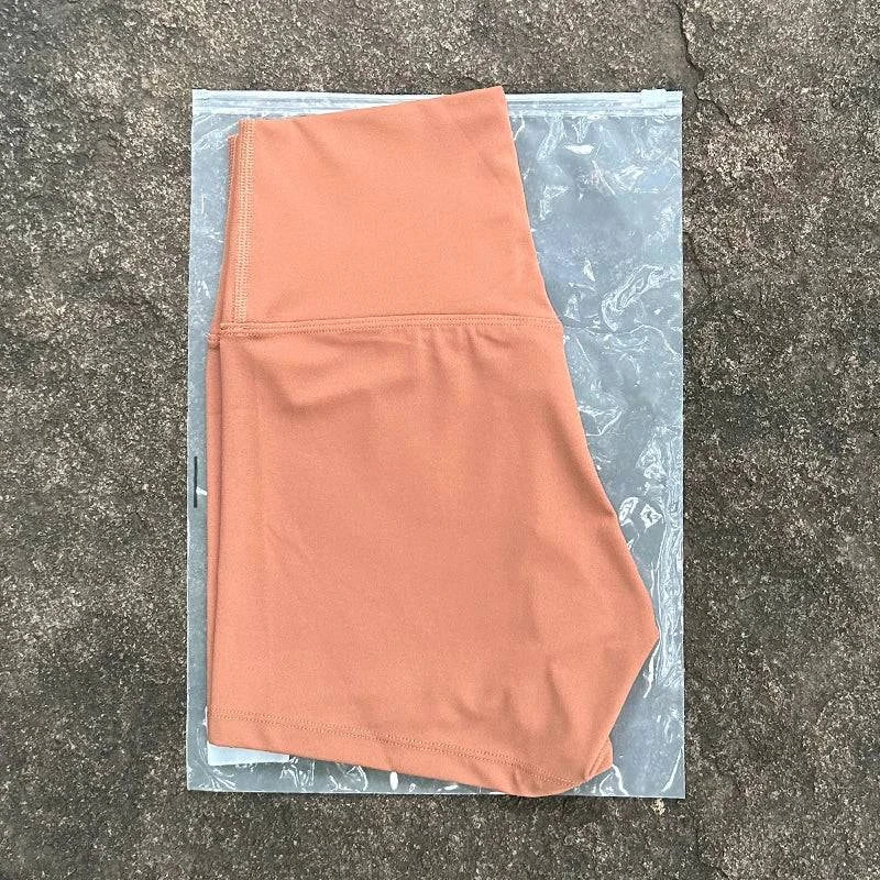 High waist yoga shorts by LYNHURD, featuring a slim fit design and elastic fabric for gym and running activities.