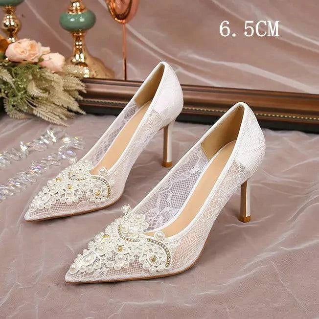 White lace high heel pumps with pearl accents for bridesmaids by LYNHURD, featuring elegant design and stylish silhouette.