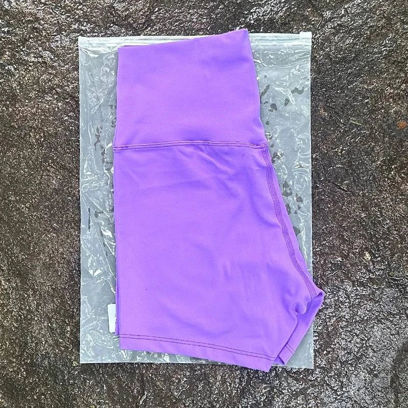 High waist LYNHURD! women’s sports shorts, slim fit, designed for yoga, running, and gym with a butt lift feature.