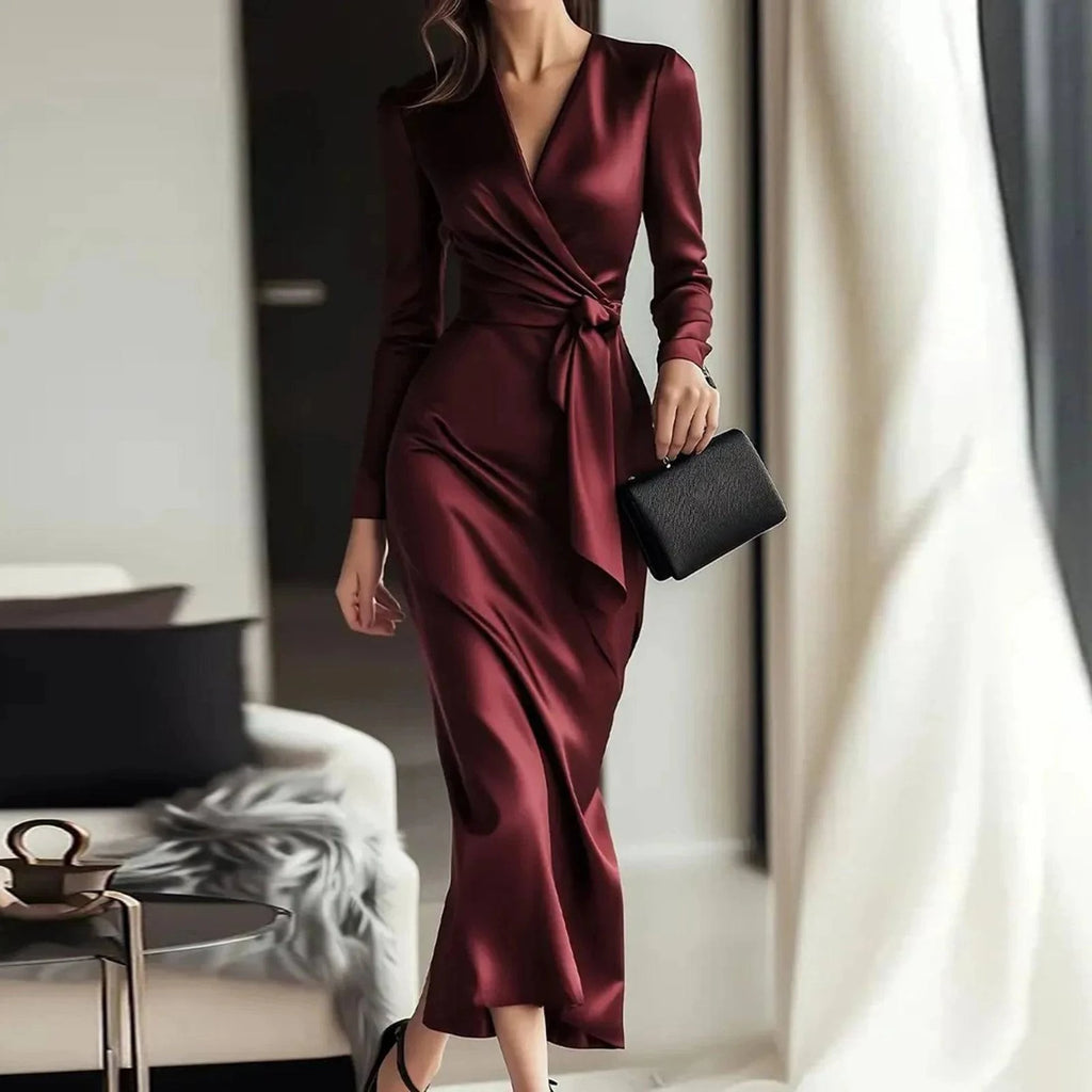 LYNHURD women's evening gown featuring a deep V neck, long sleeves, and a high slit in a classic bodycon style.