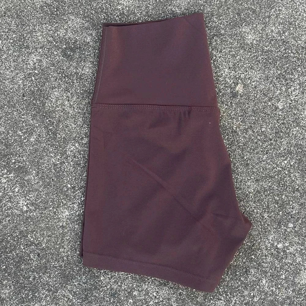 High waist LYNHURD women's sports shorts, slim fit, designed for yoga, running, and gym activities, showcasing a butt lift effect.