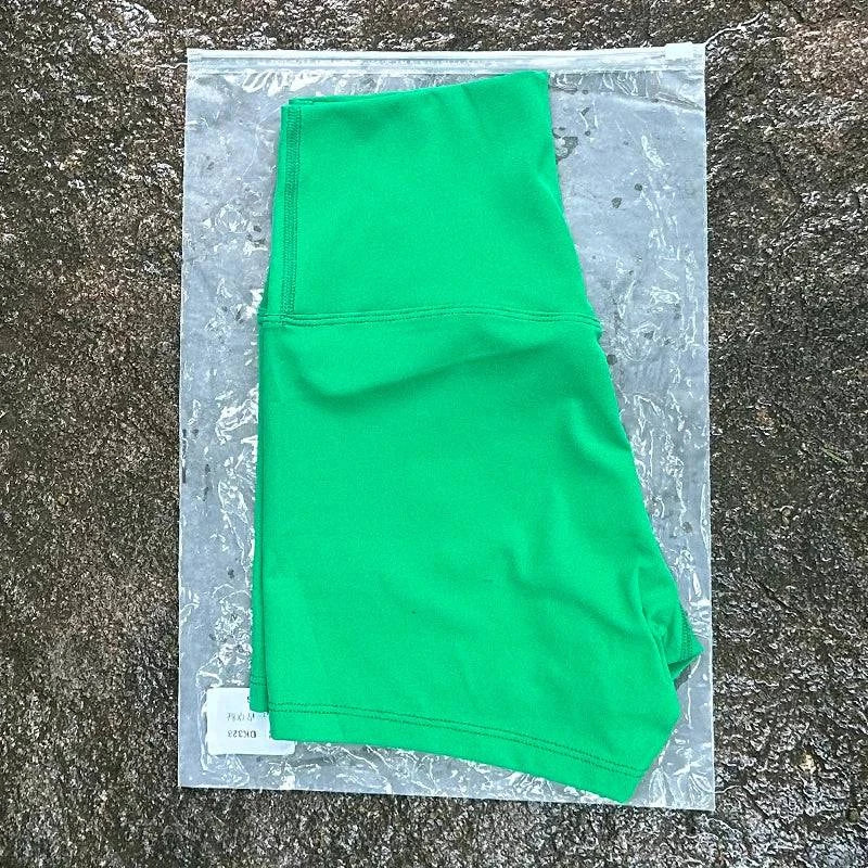 High waist LYNHURD! women's sports shorts, slim fit, designed for yoga, running, and gym workouts with butt lift feature.