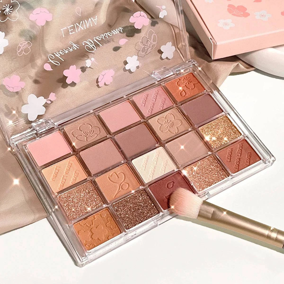 20-color eyeshadow palette by LYNHURD! featuring glitter, shimmer, and matte finishes in vibrant shades.