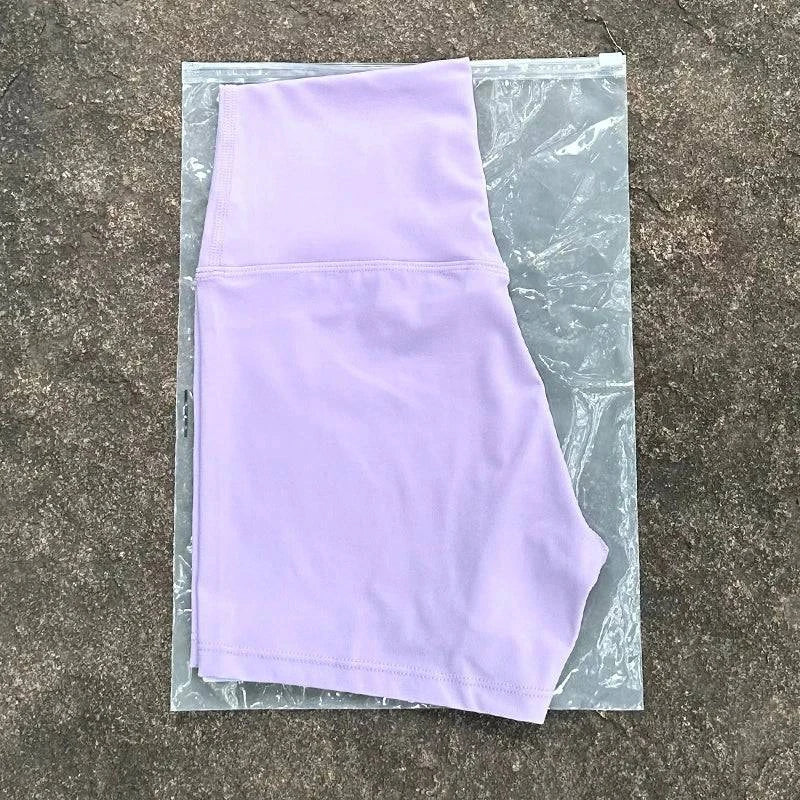 High waist LYNHURD! yoga shorts in black, featuring a slim fit and butt lift design for gym and running activities.