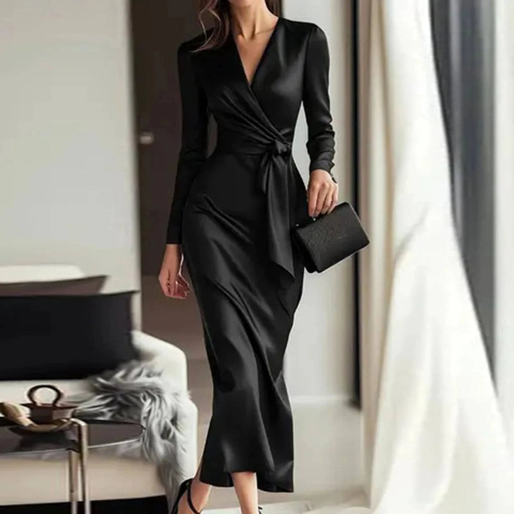 Women’s LYNHURD evening gown featuring a deep V-neck, long sleeves, and high slit in a classic bodycon maxi style.