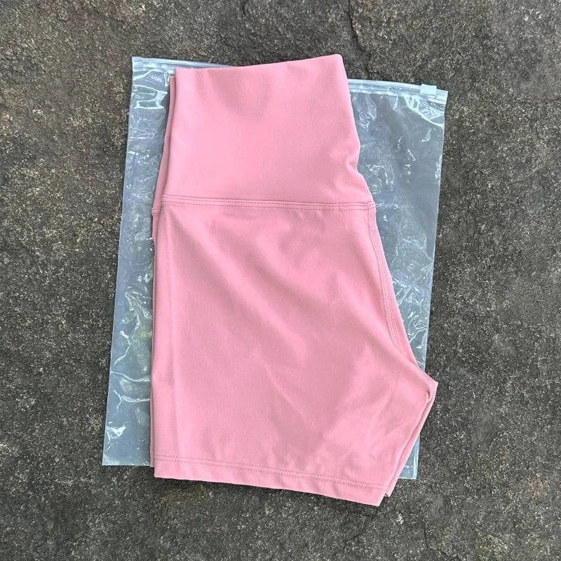 High waist LYNHURD! women's sports shorts in black, designed for yoga and running with a slim fit and butt lift feature.