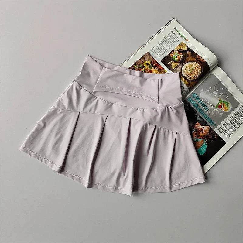 Women's high waist sports short skirt in black, designed for fitness, yoga, running, and tennis by LYNHURD.