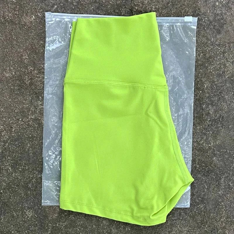 High waist LYNHURD! women's sports shorts in slim fit, designed for yoga, gym, and running with a butt lift feature.