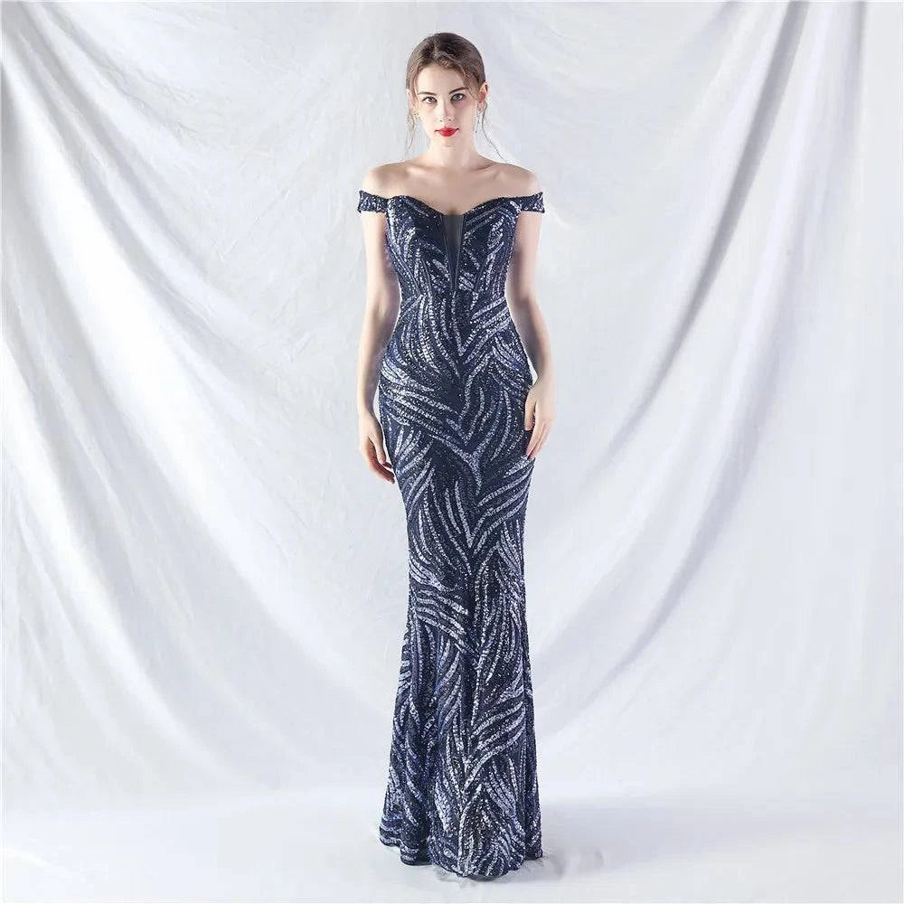 Elegant LYNHURD! ball gown evening dress for formal occasions, featuring intricate detailing and a flowing silhouette.