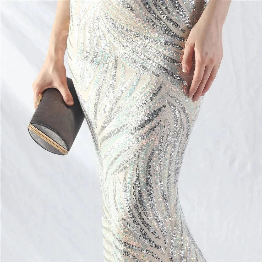 Elegant LYNHURD! ball gown evening dress for formal occasions, featuring luxurious design and flowing fabric.