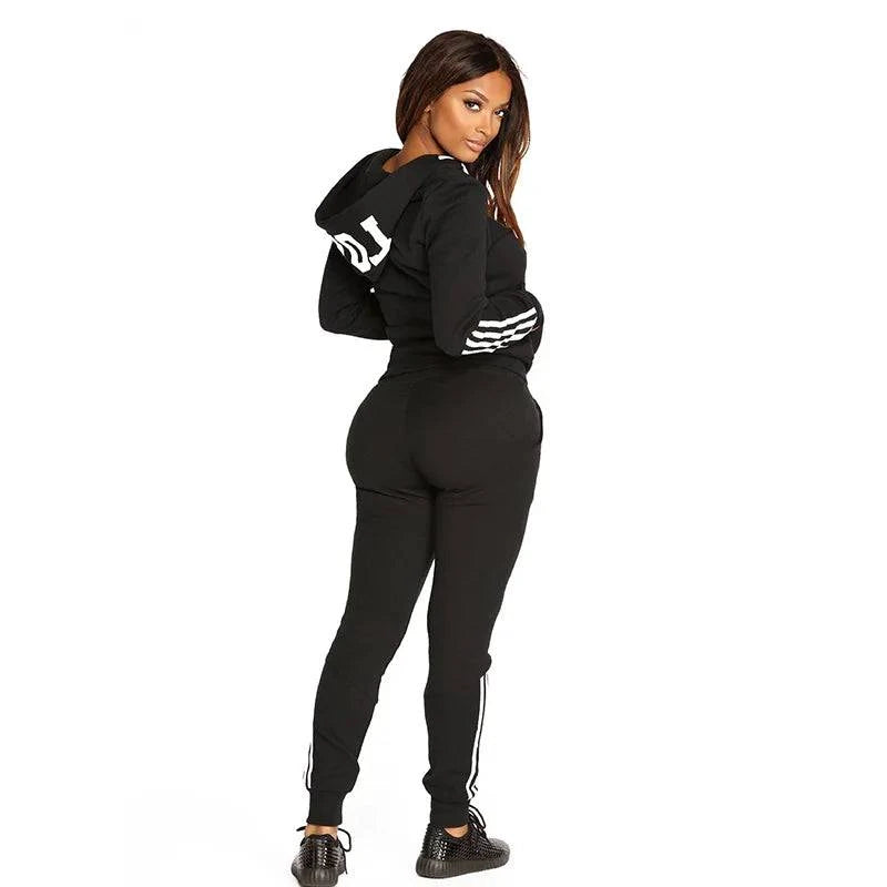 Autumn winter women’s tracksuit set by LYNHURD featuring a hooded sweatshirt and jogger pants in a casual print design.