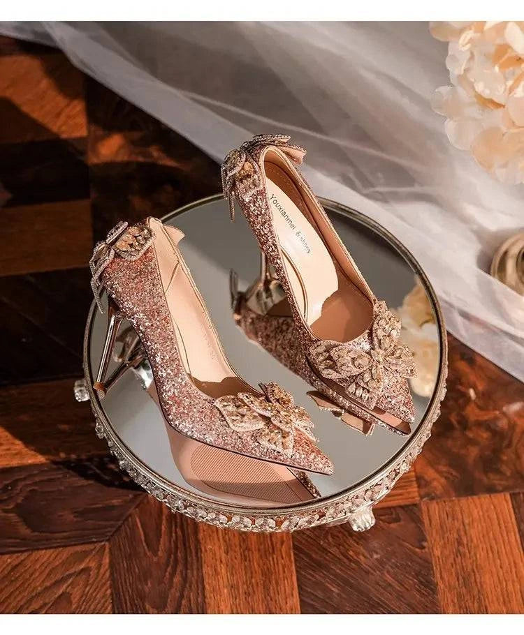 2024 LYNHURD silver high heels with a pointed toe and bow detail, featuring a shiny crystal design for women.