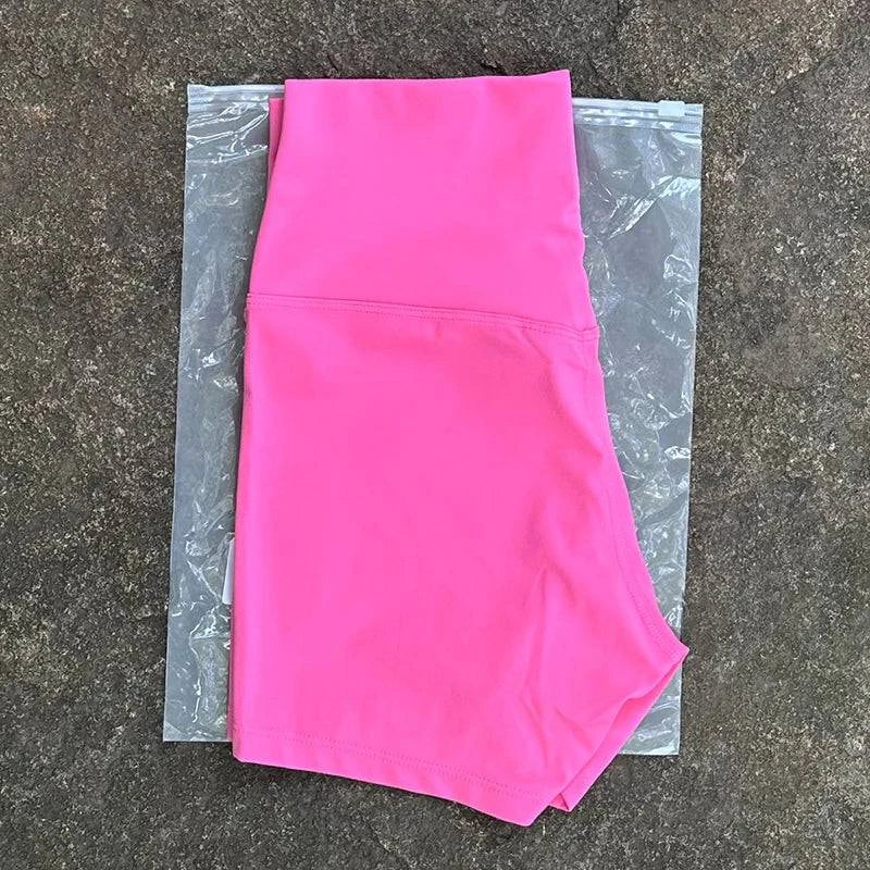 High waist LYNHURD! women's sports shorts in black, designed for yoga and running with a slim fit and butt lift feature.