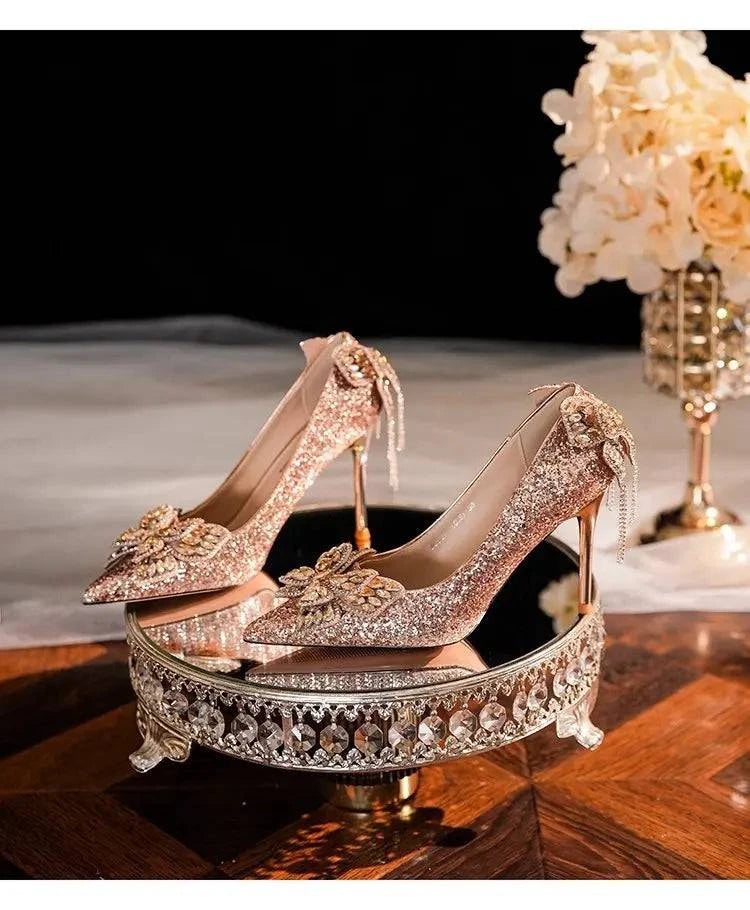 2024 LYNHURD silver high heels with a pointed toe and bow detail, featuring a shining crystal design for women.