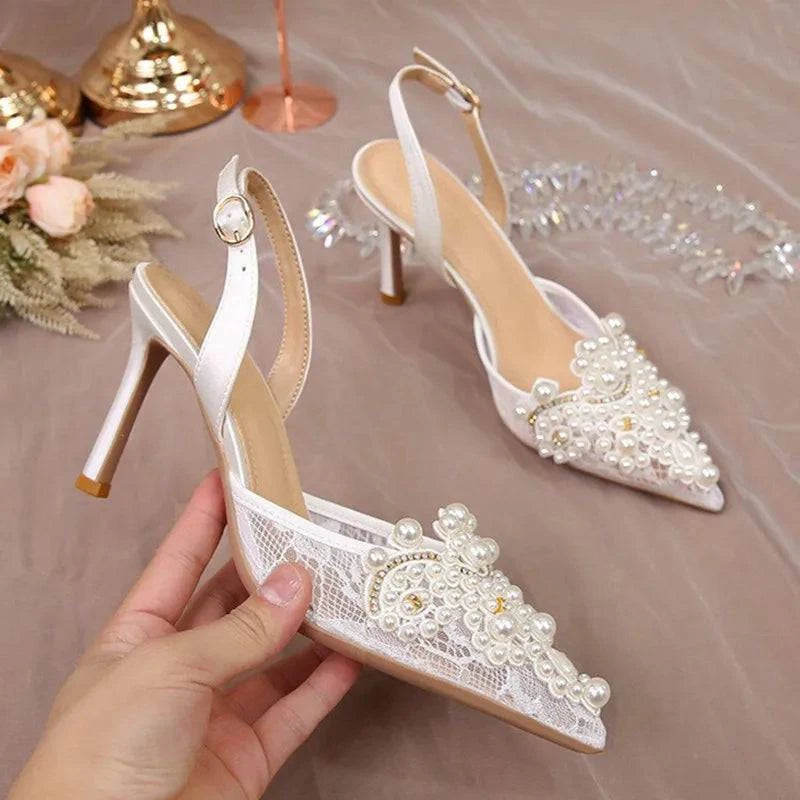 White lace high heel pumps with pearl accents for bridesmaids by LYNHURD, showcasing elegant bridal footwear design.