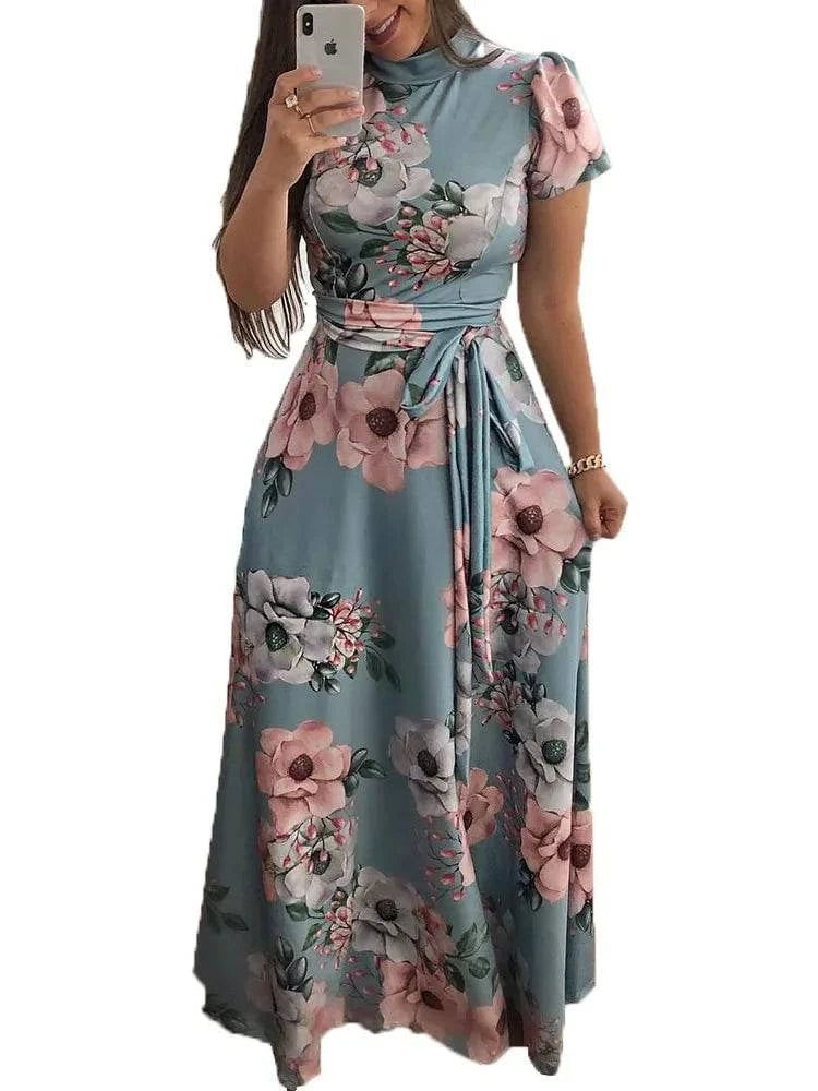 Women's LYNHURD long sleeve floral dress with round neck and floor-length skirt, perfect for casual outings.