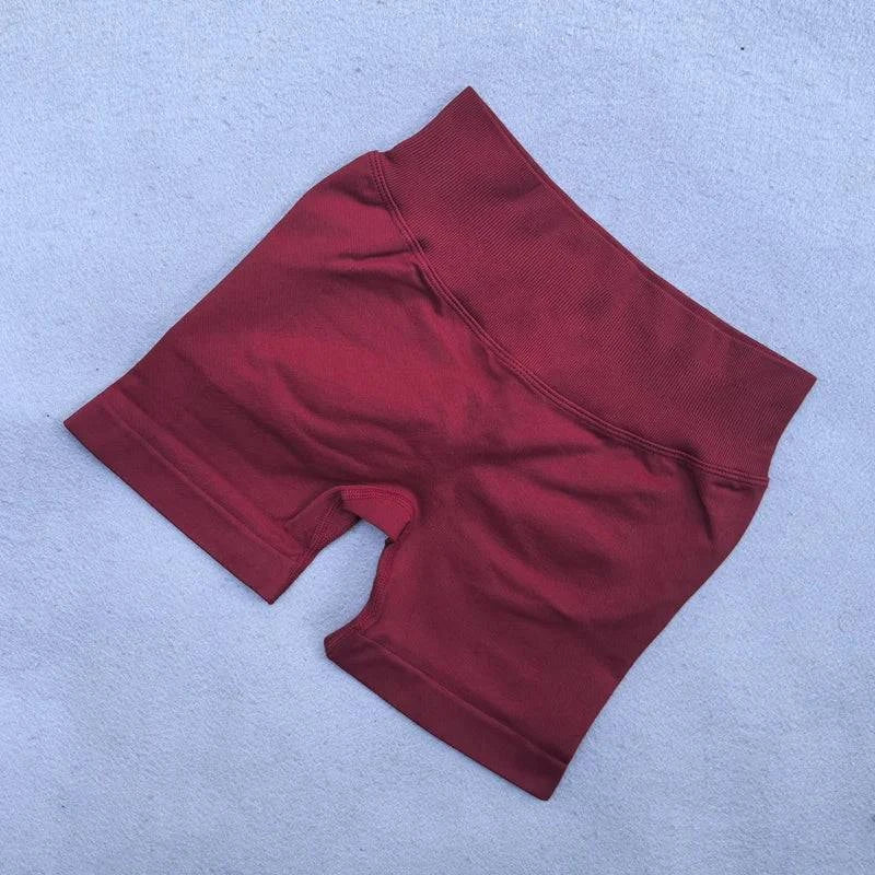 Women’s LYNHURD! backless halter top and high waist seamless shorts yoga set in a stylish gym outfit for workouts.