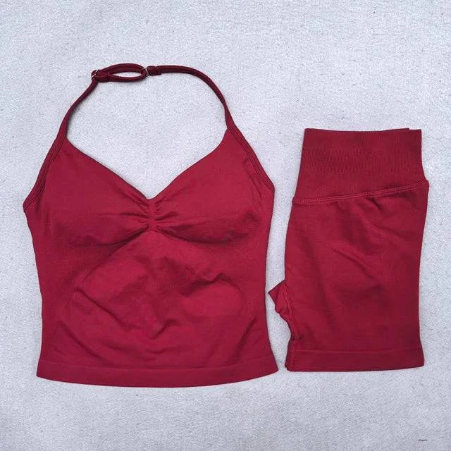 Women's LYNHURD! backless halter yoga set with seamless shorts in a stylish gym outfit for fitness and workouts.